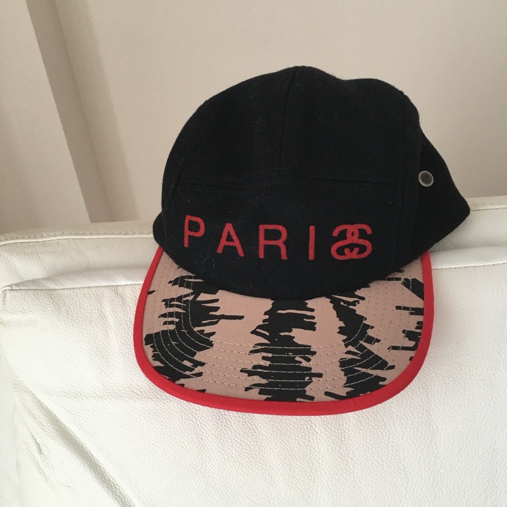 Stussy Black Cap with Red 'PARIS' Lettering and Red-Trim Brim
